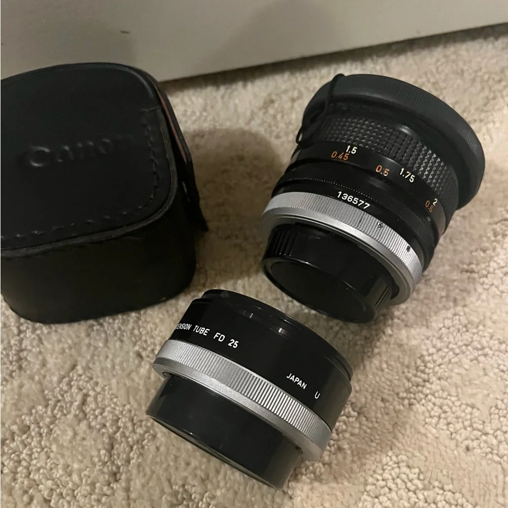Canon camera, two 50mm lenses and tripod all included. it’s been well stored